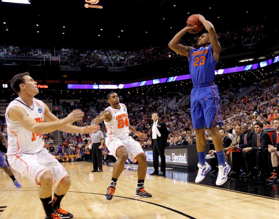 Florida Gators guard Bradley Beal shoots against the Louisville Cardinals during the first half of the Elite 8 game on March 24, 2012, at the U.S. Airways Center in Phoenix.