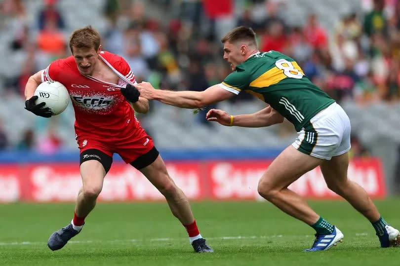 Photo shows Derry's Brendan Rogers and Kerry's Diarmuid O’Connor