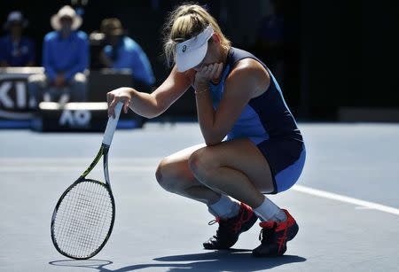 Tennis - Australian Open - Melbourne Park, Melbourne, Australia - 26/1/17 Coco Vandeweghe of the U.S. rests on her racket after losing a point during her Women's singles semi-final match against Venus Williams of the U.S. .REUTERS/Issei Kato