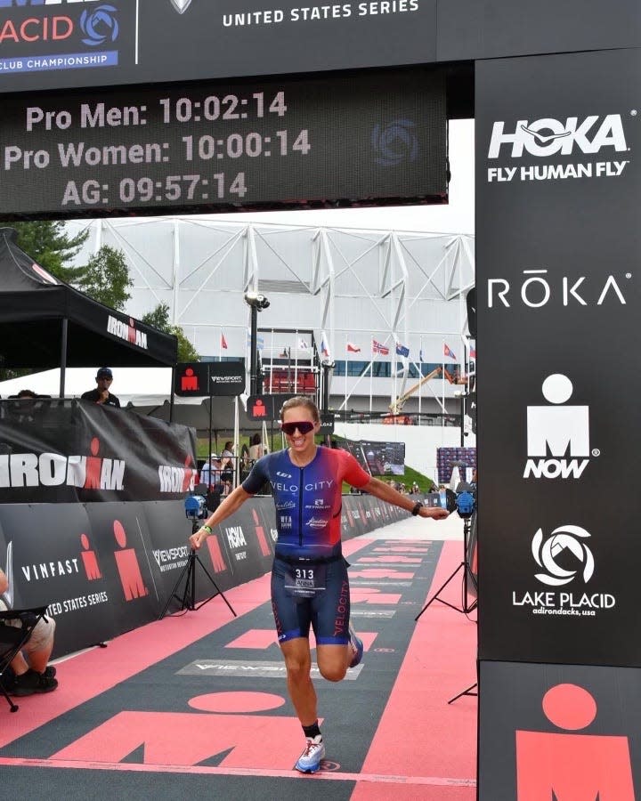 Annamarie Strehlow crosses the finish line at Ironman Lake Placid with a time of 9 hours, 56 minutes and 52 seconds.