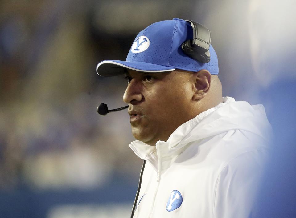 BYU coach Kalani Sitake coaches from the sideline against Cincinnati at LaVell Edwards Stadium in Provo, Sept. 29, 2023. 