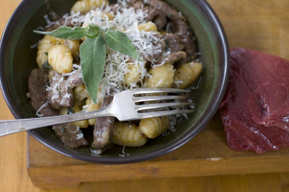 In this image taken on Feb. 27, 2012, bison with sage and gnocchi is shown in Concord, N.H. (AP Photo/Matthew Mead)