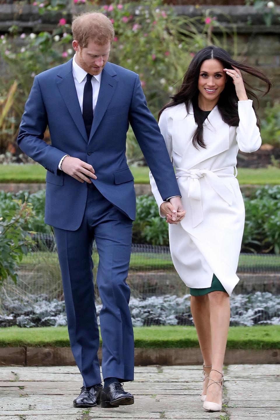 Prince Harry and actress Meghan Markle during an official photocall to announce their engagement at The Sunken Gardens at Kensington Palace on November 27, 2017 in London, England. Prince Harry and Meghan Markle have been a couple officially since November 2016 and are due to marry in Spring 2018