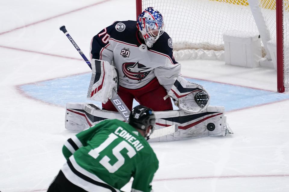 Dallas Stars left wing Blake Comeau (15) has his shot deflected by Columbus Blue Jackets goaltender Joonas Korpisalo (70) during the first period of an NHL hockey game in Dallas, Thursday, March 4, 2021. (AP Photo/Tony Gutierrez)