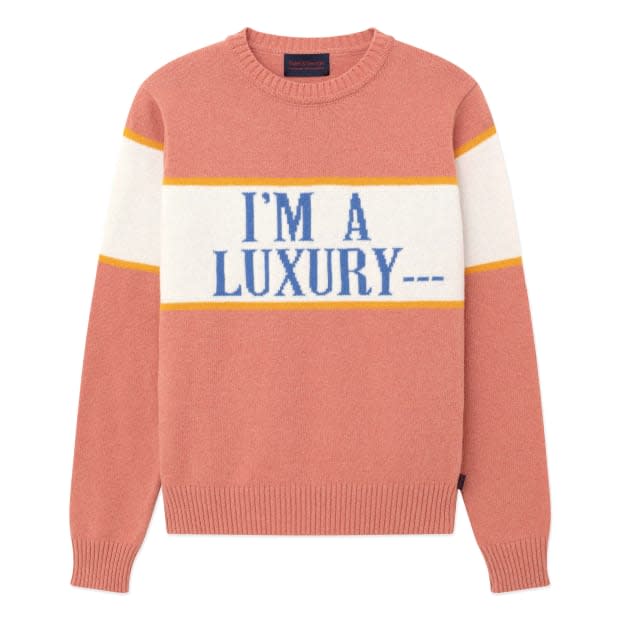 <p>Gyles & George x Rowing Blazers "I'm A Luxury" Sweater, $295,<a href="https://rowingblazers.com/collections/womens-sweaters/products/im-a-luxury-sweater-womens?primary=clothing&variant=32961842806818" rel="nofollow noopener" target="_blank" data-ylk="slk:available here;elm:context_link;itc:0;sec:content-canvas" class="link "> available here</a> (sizes XS-XXXL). </p>