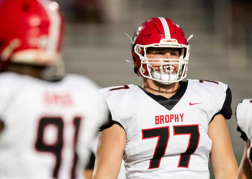 Brophy Prep Broncos tackle Logan Powell (77) prepares for a play against the Basha Bears at Basha High School's football field in Chandler on Sept. 28, 2023.