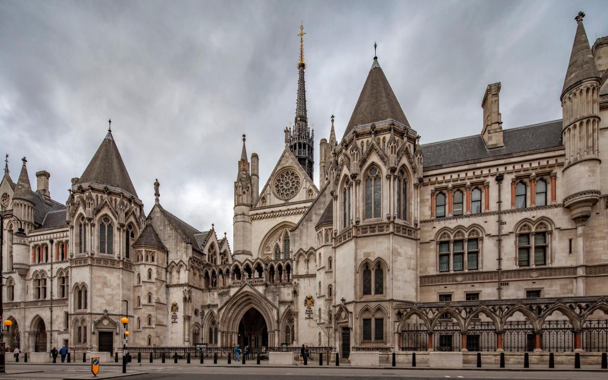 The Royal Courts of Justice, which houses both the High Court and Court of Appeal - David Bank