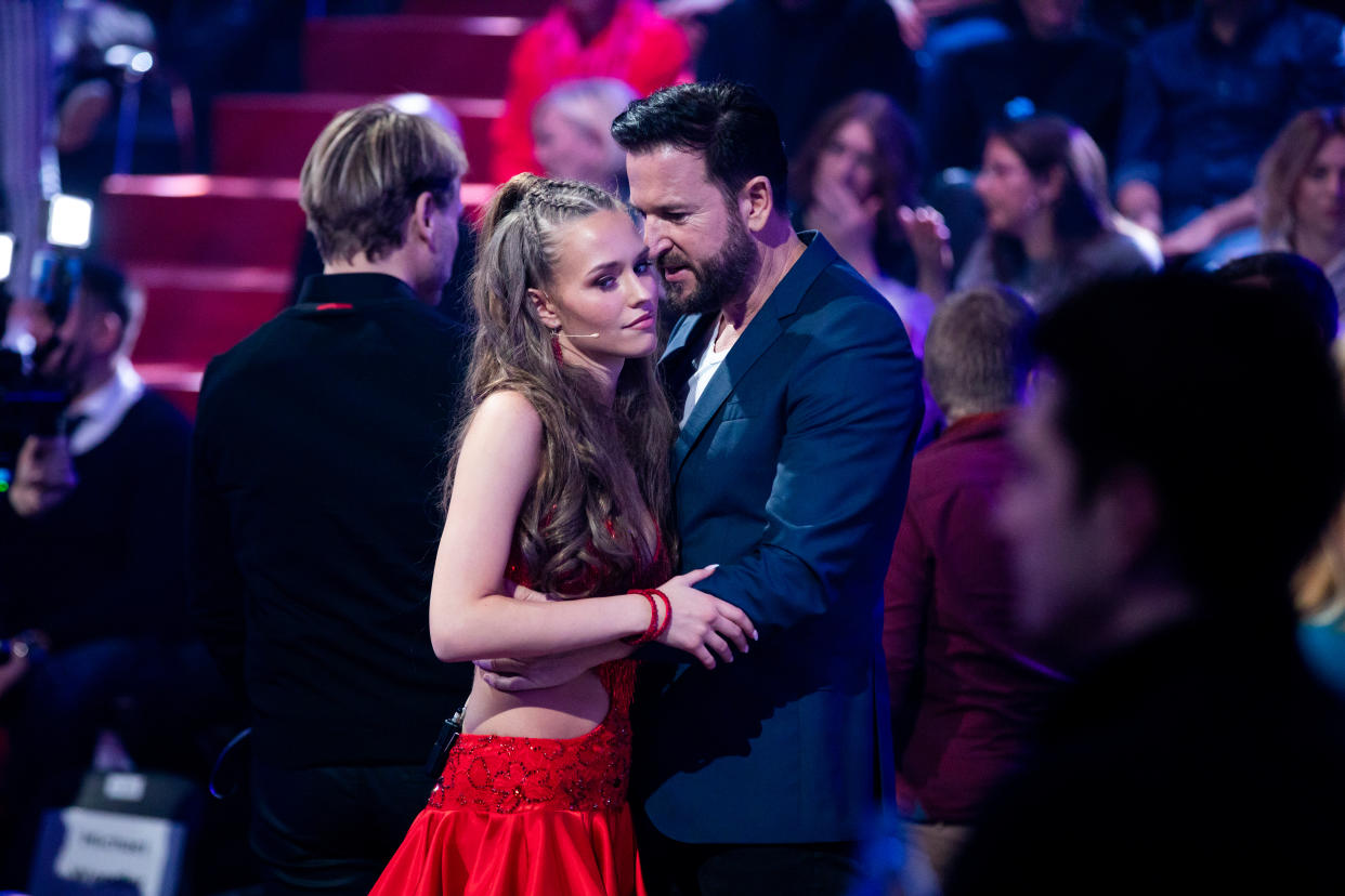 COLOGNE, GERMANY - FEBRUARY 21:  Michael Wendler and Laura Mueller are seen on stage during the pre-show 