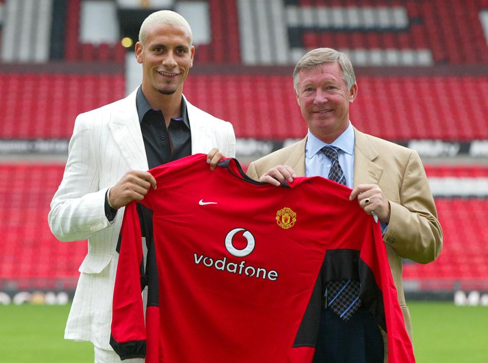Manchester United's new  30million signing Rio Ferdinand stands with club manager Alex Ferguson as they pose for photographers at the club's Old Trafford ground.   *  The 23-year-old former Leeds defender smashed British transfer fee records when he moved across the Pennines to become the sixth most expensive footballer of all time.  THIS PICTURE CAN ONLY BE USED WITHIN THE CONTEXT OF AN EDITORIAL FEATURE. NO WEBSITE/INTERNET USE UNLESS SITE IS REGISTERED WITH FOOTBALL ASSOCIATION PREMIER LEAGUE.   (Photo by Martin Rickett - PA Images/PA Images via Getty Images)