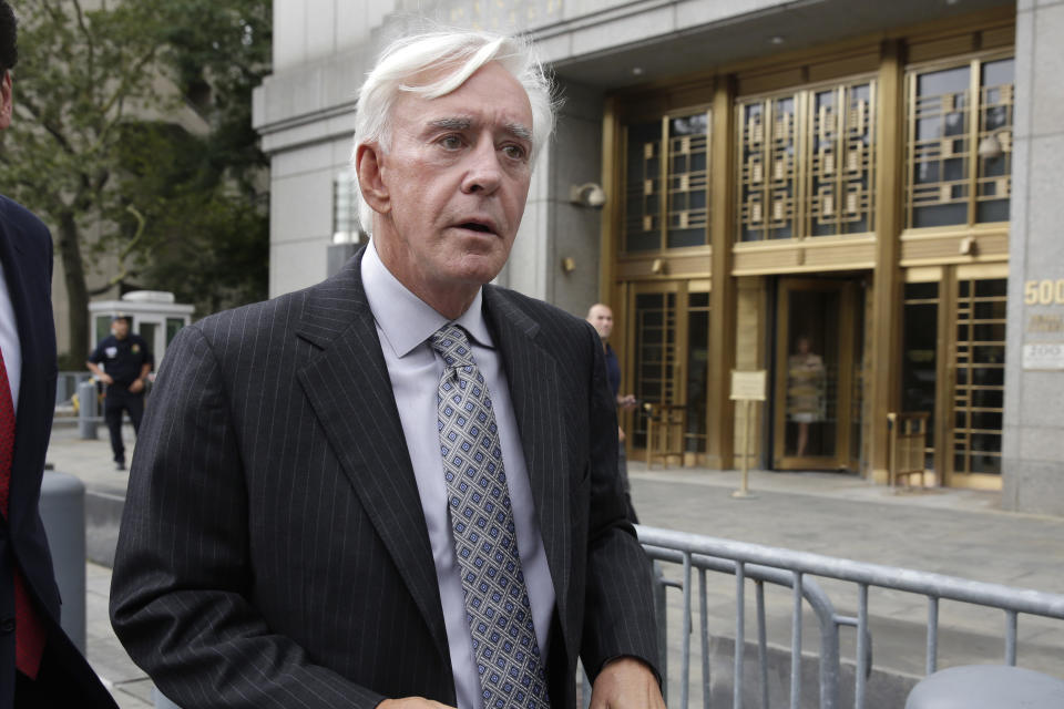 FILE - In this July 27, 2017, file photo, Las Vegas gambler William "Billy" Walters leaves Manhattan federal court in New York, July 27, 2017. Phil Mickelson has wagered more than $1 billion over the last three decades and wanted to place a $400,000 bet on the 2012 Ryder Cup while playing for Team USA, according to a much-anticipated book by renowned gambler Billy Walters. (AP Photo/Richard Drew, File)