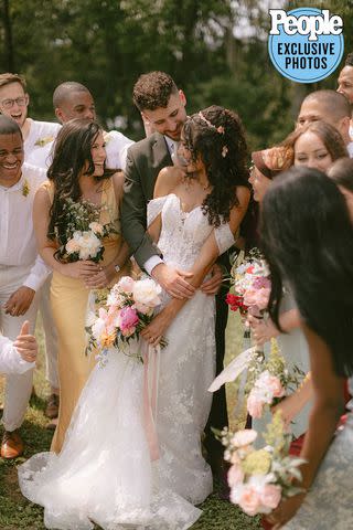 <p>laina tortorici photo</p> Christian Paul and Tai Reeder with their wedding party
