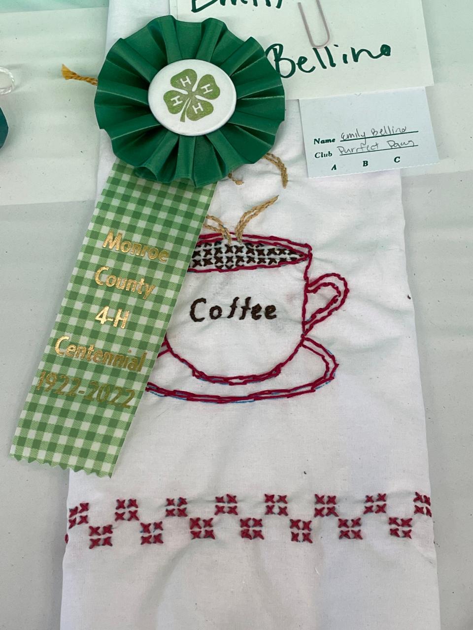 Emily Bellino entered an embroidered towel in the fair. All Centennial Projects received a special Centennial Ribbon.