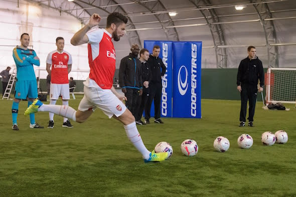 20160310       Copyright image 2016Â©Cooper Tires & Arsenal FC - Precision Challenge - The Pendulum, at the Arsenal Training Ground, London ColneyThe Challenge is set by Andy Ansah and requires the players to kick a ball through a swinging tyre at the end of a pendulum to score points.Cooper Tires is the first ever Official Tyre Partner of Arsenal Football Club. The partnership with AFC is the first such sponsorship programme that Cooper Europe.For photographic enquiries please call Anthony Upton 07973 830 517 or email info@anthonyupton.com This image is copyright Anthony Upton 2016Â©.This image has been supplied by Anthony Upton and must be credited Anthony Upton. The author is asserting his full Moral rights in relation to the publication of this image. All rights reserved. Rights for onward transmission of any image or file is not granted or implied. Changing or deleting Copyright information is illegal as specified in the Copyright, Design and Patents Act 1988. If you are in any way unsure of your right to publish this image please contact +447973 830 517 or email: info@anthonyupton.com