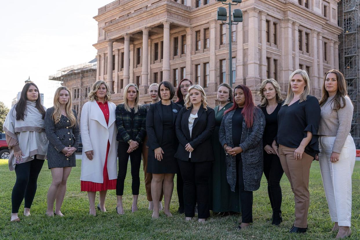 Center for Reproductive Rights attorney Molly Duane and plaintiffs stand outside the Texas Capitol after the Texas Supreme Court heard oral arguments for Zurawski v. State of Texas Tuesday, Nov. 28, 2023. The plaintiffs, 20 women who were denied abortions despite severe pregnancy complications and two OB-GYNs suing on behalf of their patients, are demanding that the state clarify medical exceptions to its near-total abortion ban.