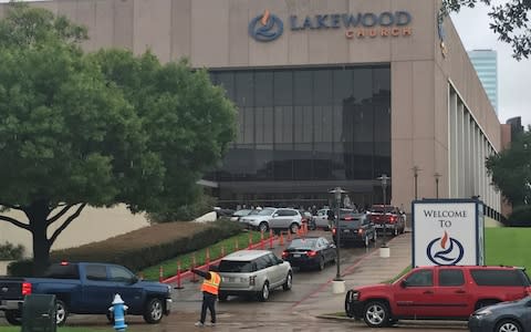 Pastor Joel Osteen has defended not opening his megachurch sooner to help Hurricane Harvey victims, claiming the city “didn't ask” for his help. Osteen, a senior pastor at the 16,000-capacity Christian Lakewood Church in Houston, was heavily criticised over accusations he initially failed to offer shelter to flooding victims. The Lakewood megachurch Credit: Reuters Joel Osteen has a HUGE church in Houston that would make a great shelter. pic.twitter.com/byqHxXrHQn— Brasilmagic (@Brasilmagic) August 28, 2017 The 54-year-old televangelist, who appeared to backtrack by later opening his doors to those left homeless, has now shifted the blame onto Houston city officials. “We were just being precautious, but the main thing is the city didn’t ask us to become a shelter then,” he told NBC’s Today Show. WATCH: “We were just being precautious, but the main thing is the city didn’t ask us to become a shelter then.” -Pastor @JoelOsteenpic.twitter.com/Qdn5vgm09H— TODAY (@TODAYshow) August 30, 2017 He added that opening the church was unsafe at the height of the flooding, explaining: “We’re all about helping people, this is what the church, and our church, is all about. “I don’t know if (the criticism) is unfounded, but if people were here they would realise there was safety issues, this building had flooded before.” Victoria and I care deeply about our fellow Houstonians. Lakewood’s doors are open and we are receiving anyone who needs shelter.— Joel Osteen (@JoelOsteen) August 29, 2017 Thank you Houston. Your response has been overwhelming. We cannot thank enough the hundreds upon hundreds of volunteers who came out today! pic.twitter.com/hI1jl5Sry8— Lakewood Church (@lakewoodch) August 29, 2017 New statement from @JoelOsteen and Lakewood Church in regards to Hurricane Harvey backlash pic.twitter.com/KLMNYysc6s— Anastasia (@AnastasiaElyseW) August 29, 2017 Osteen continued: “It’s easy to say, ‘Wow, there’s that building. They’re not using it.’ But we don’t have volunteers. “We don’t have staff that could get here. We’re all about helping the city whenever we could - if they would have asked us to become a shelter early on, we would have prepared for it.” Houston's @indivisible_usa is acquainted with @JoelOsteen's Lakewood Church. They took these pics about an hour ago w/ commentary. pic.twitter.com/YTWrD9UG1z— Charles Clymer��️‍�� (@cmclymer) August 28, 2017 The church initially said it was “inaccessible due to severe flooding”, however photos shared on social media showed no flood damage and suggested it could be reached. One critic tweeted the pastor: “If you were a real Christian, you'd be opening your doors to your displaced neighbours.” The church later opened its doors Credit: AP Pastor Osteen responded to the criticism, insisting: “We have never closed our doors.” The church later opened its doors to flood victims following the barrage of online criticism. Meanwhile, many inspiring acts of heroism and kindness have emerged from the devastation of Harvey. Hurricane Harvey hits Texas, in pictures