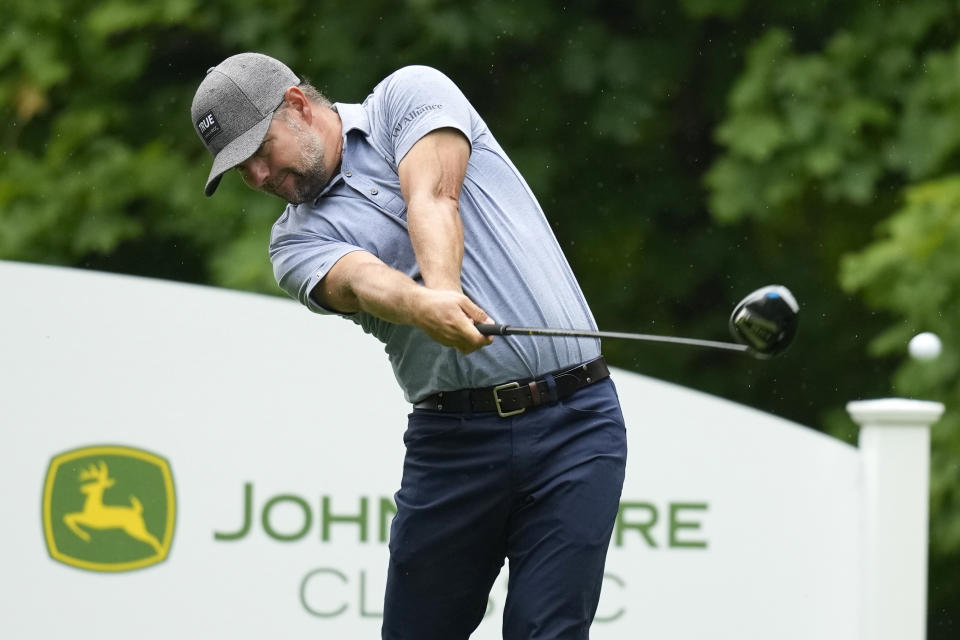 Ryan Moore hits off the 17th tee during the third round of the John Deere Classic golf tournament, Saturday, July 10, 2021, at TPC Deere Run in Silvis, Ill. (AP Photo/Charlie Neibergall)