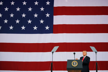 President Donald Trump arrives to delivers remarks. REUTERS/Carlos Barria