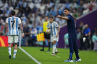 Argentina's head coach Lionel Scaloni instructs his players during the World Cup semifinal soccer match between Argentina and Croatia at the Lusail Stadium in Lusail, Qatar, Tuesday, Dec. 13, 2022. (AP Photo/Natacha Pisarenko)