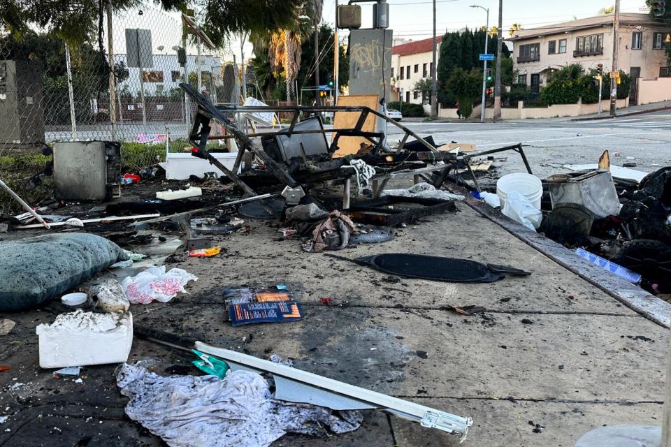 A burned-out encampment at Wilcox and Franklin avenues in Hollywood on Jan. 29.