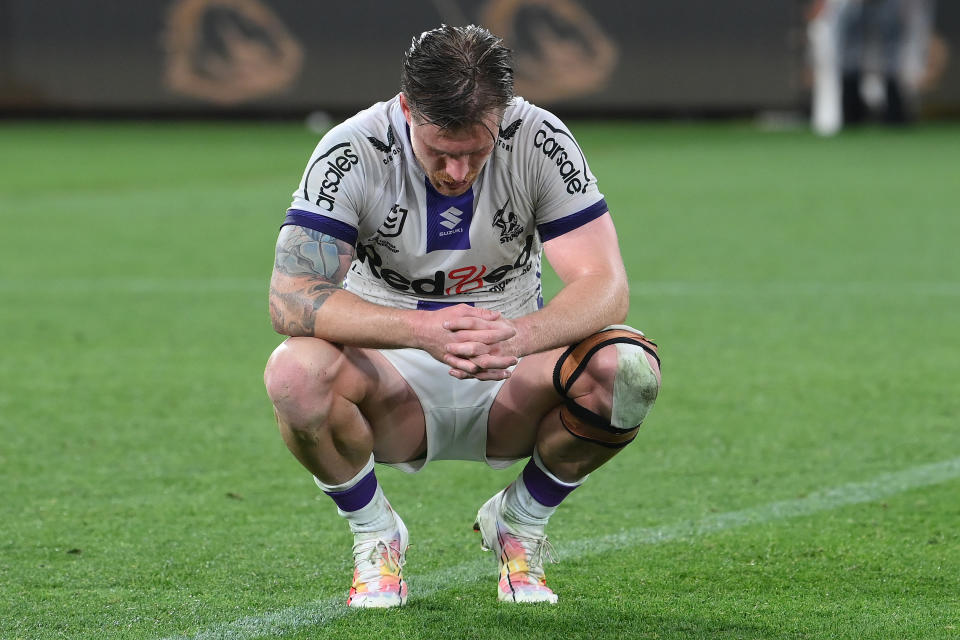 BRISBANE, AUSTRALIA - SEPTEMBER 08:  Cameron Munster of the Storm reacts after losing the NRL Qualifying Final match between the Brisbane Broncos and Melbourne Storm at Suncorp Stadium on September 08, 2023 in Brisbane, Australia. (Photo by Bradley Kanaris/Getty Images)