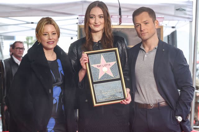 John Salangsang/Shutterstock Elizabeth Banks, Karsen Liotta and Taron Egerton at Ray Liotta's Hollywood Walk of Fame ceremony on February 24, 2023