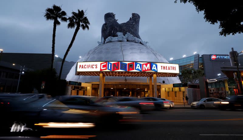 FILE PHOTO: A prop promoting the film "Godzilla: King of the Monsters" is pictured on the roof of the Cinerama Dome theatre in Los Angeles