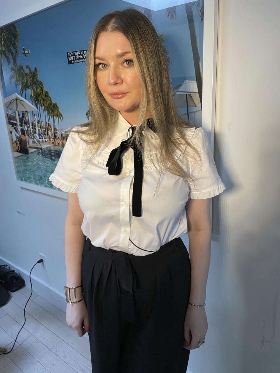 Anna Delvey, also known as Anna Sorokin, poses at her apartment in New York on May 26, 2023, to promote her podcast, “The Anna Delvey Show.” (AP Photo/John Carucci)