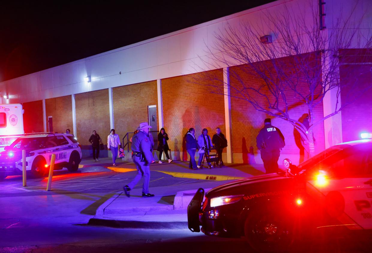 People walk near the Cielo Vista Mall after being evacuated by police following a shooting, in El Paso, Texas, U.S February 15, 2023 (REUTERS)