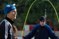 Finnish Boxer Eva Wahlstrom (L) warms up