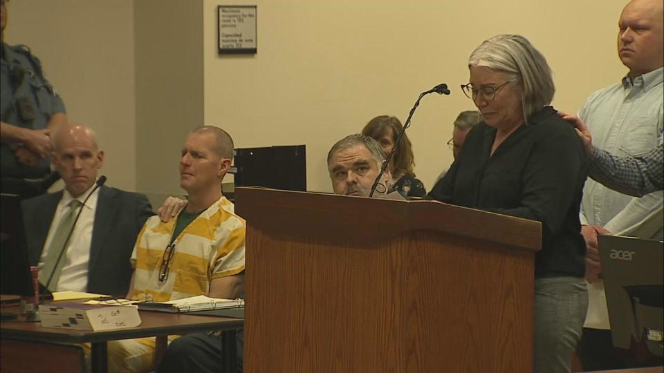 Katie Cichuniec, wife of former Aurora paramedic Peter Cichuniec, speaks on her husband's behalf during the victim impact statement portion of her husband's sentencing hearing on Friday, March 1, 2024. / Credit: CBS