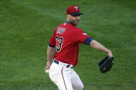 Minnesota Twins' pitcher J.A. Happ throws against the Texas Rangers in the first inning of a baseball game, Tuesday, May 4, 2021, in Minneapolis. (AP Photo/Jim Mone)