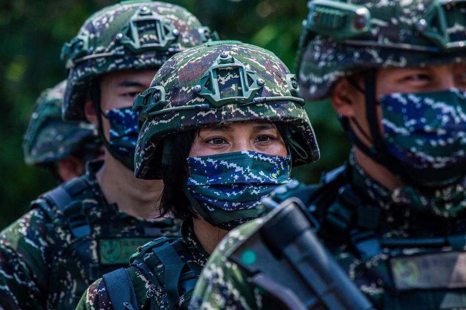 Taiwanese military personnel stand in a line during the Han Kuang military exercise, which simulates China's People's Liberation Army nvading the island, on July 27, 2022 in New Taipei City, Taiwan. (Annabelle Chih / Getty Images)