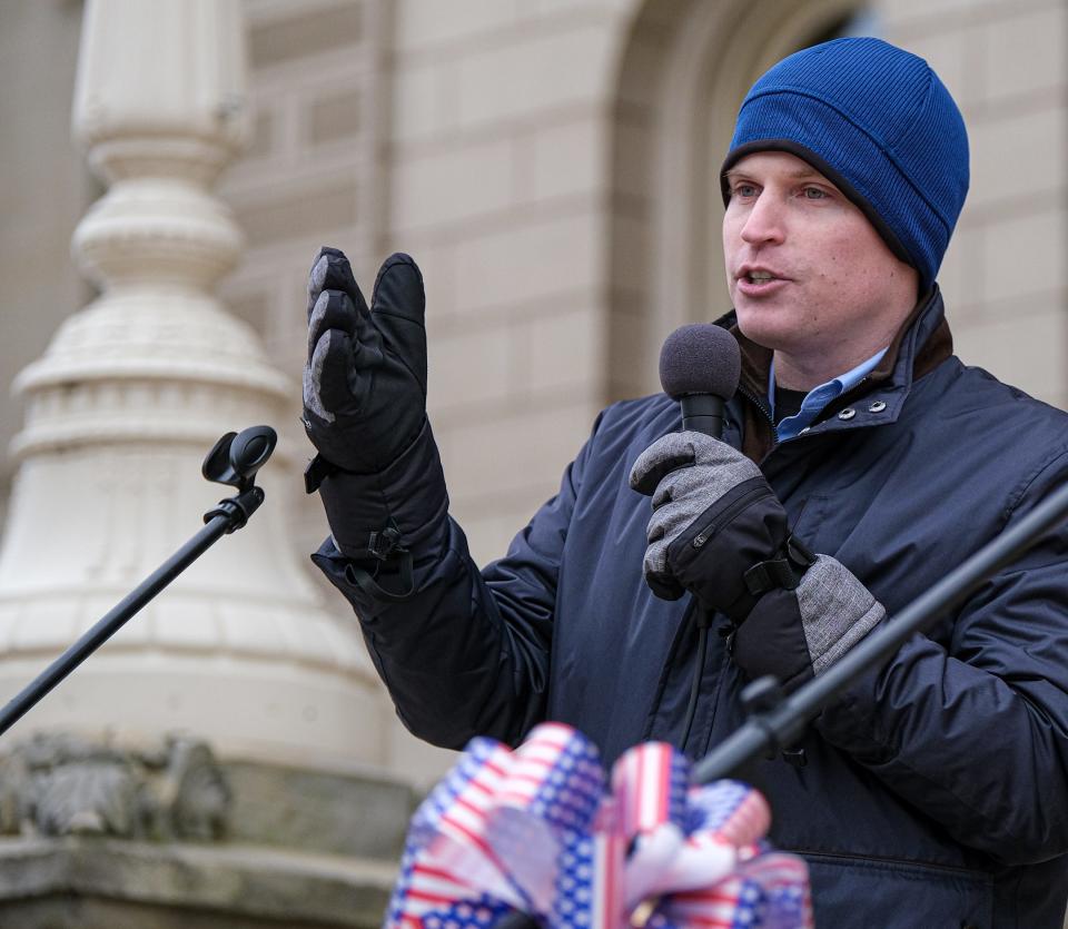 Matt Seifried from RNC Election Integrity, speaks to about 100 former President Trump supporters attending the MAGA Rally at the State Capitol in Lansing Saturday, March 26, 2022.