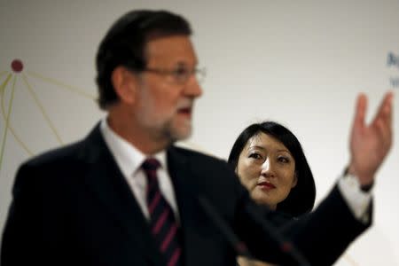 French Culture Minister Fleur Pellerin (R) listens as Spain's Prime Minister Mariano Rajoy delivers his speech during the opening ceremony of the Malaga branch of the Centre Pompidou in Malaga, southern Spain March 28, 2015. REUTERS/Jon Nazca