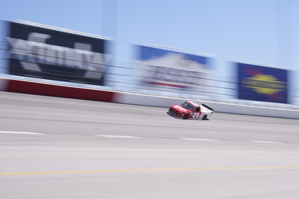 Brett Moffitt (23) runs during a NASCAR Truck race Sunday, Sept. 6, 2020, in Darlington, S.C. (AP Photo/Chris Carlson)