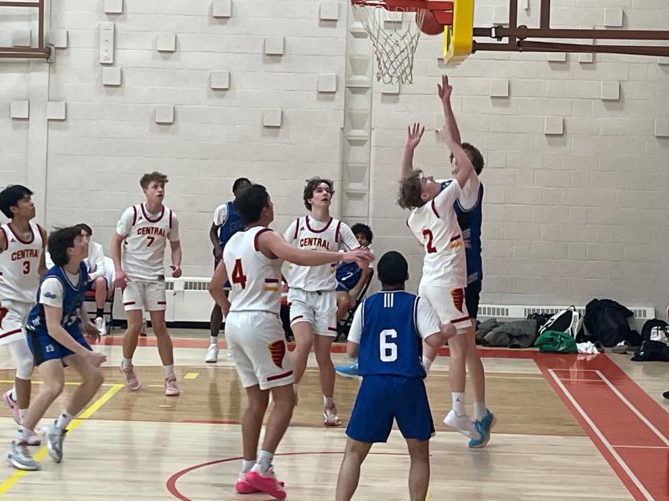 Some of these players, vying for a spot in the HOOPLA provincial basketball tournament, will not make it to the tournament, even if they win. The tournament's fate lies in contract negotiations between the Saskatchewan Teachers' Federation and the provincial government. 