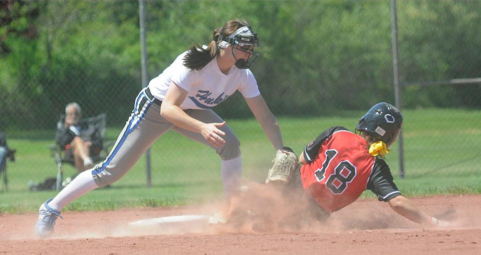 Manchester's Alli Hodgkinson is out at second during the Div. III District semifinal softball game between Northwestern and Manchester at Wellington Community Park on May 17, 2022.