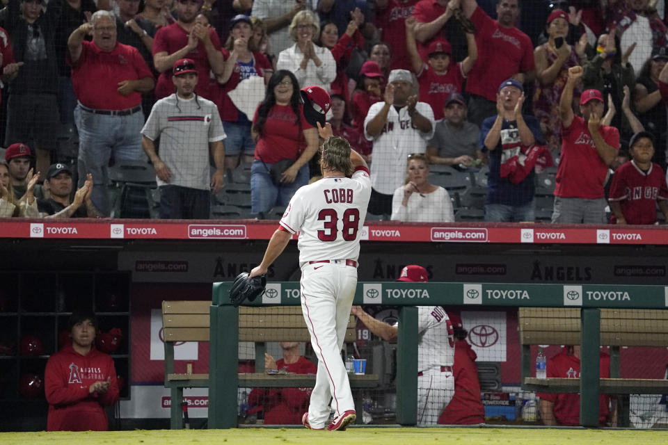 Los Angeles Angels starting pitcher Alex Cobb acknowledges the crowd after being taken out of the game in the eighth inning of a baseball game against the Baltimore Orioles Saturday, July 3, 2021, in Anaheim, Calif. (AP Photo/Mark J. Terrill)