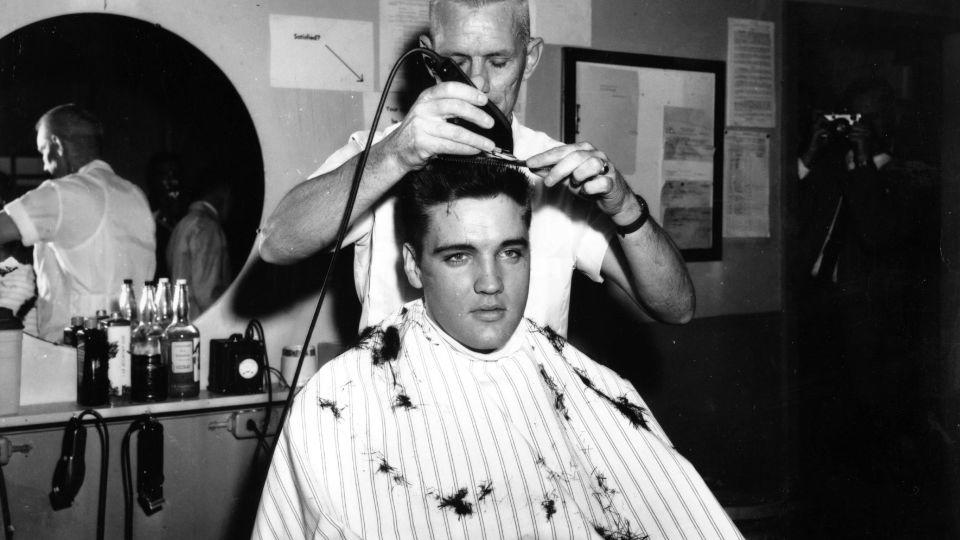 Elvis Presley had his hair shorn off in preparation for his tour of duty in in the United States Army in 1959 in Germany. - Michael Ochs Archives/Getty Images
