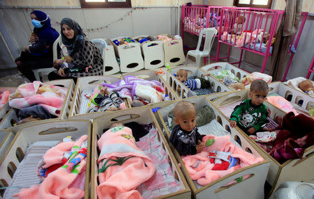 Children of Islamic State fighters, who suffer from malnourishment, are seen at a hospital in Hasaka, northeastern Syria April 5, 2019. REUTERS/Ali Hashisho