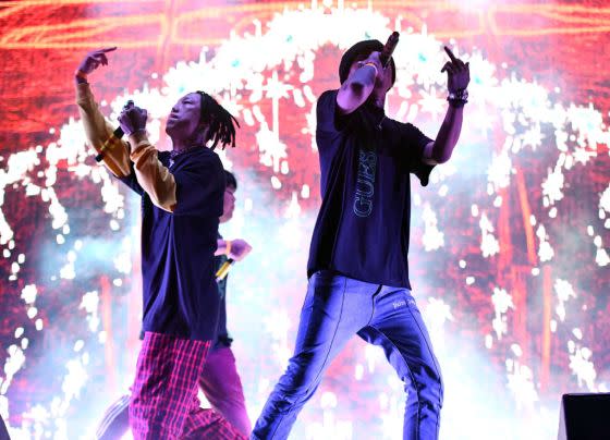 Members of the rap group Higher Brothers perform at the Head in the Clouds festival in Los Angeles in 2018.<span class="copyright">Scott Dudelson—Getty Images</span>