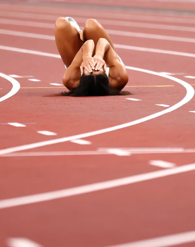 Johnson-Thompson reacts after falling down in the 200m (Photo: Andrew Boyers via Reuters)