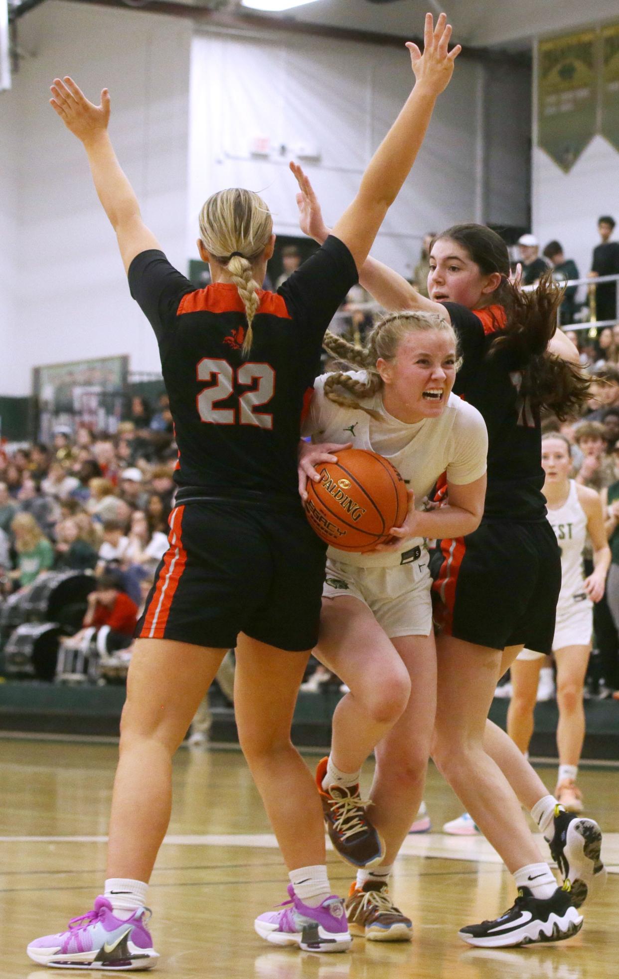 West High’s Grace Fincham, seen here in a game versus City High, had 20 points against Dubuque Hempstead on Jan.22.