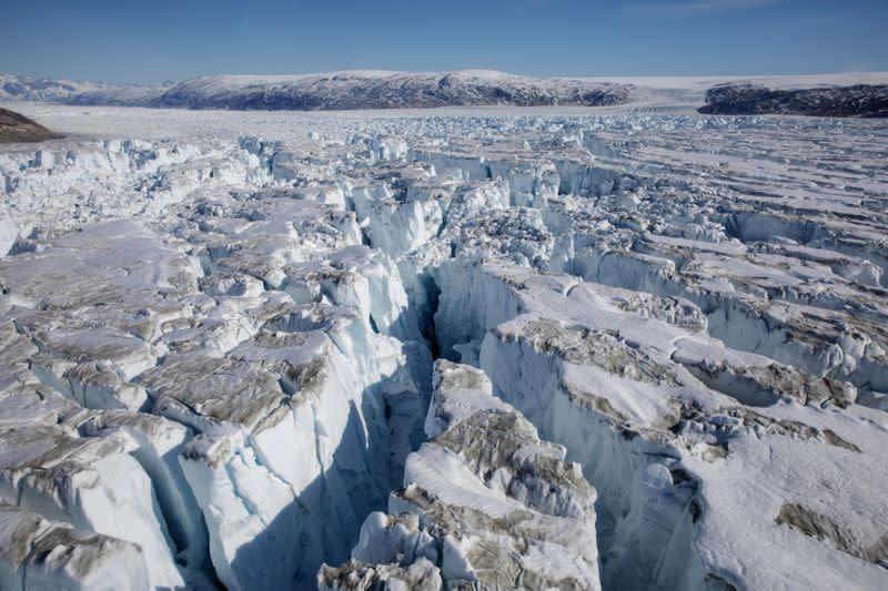 FILE PHOTO: FILE PHOTO: Crevasses form on top of the Helheim glacier near Tasiilaq, Greenland
