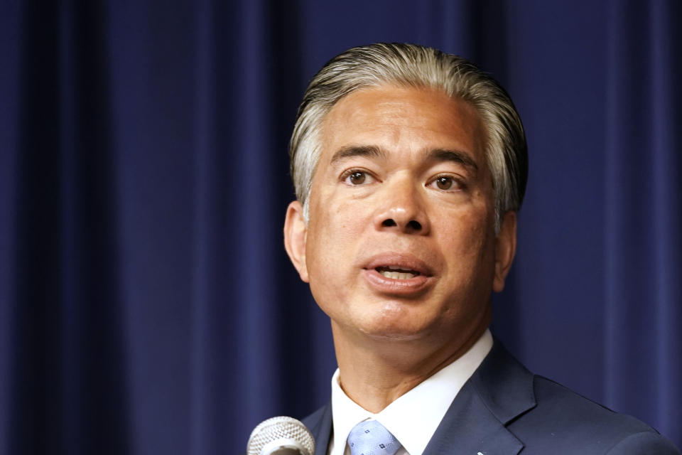 FILE - California Attorney General Rob Bonta talks at a news conference in Sacramento, Calif., June 28, 2022. Bonta announced, Tuesday, Aug. 2, 2022, that Rent-A-Center, one of the nation's largest rent-to-own companies, will pay $15.5 million to settle California'a allegations that it misled and overcharged tens of thousands of customers. (AP Photo/Rich Pedroncelli, File)