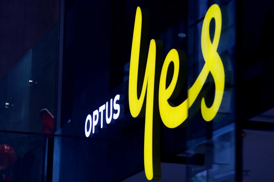 An Optus store window in Sydney. Photographer: Lisa Maree Williams/Getty Images