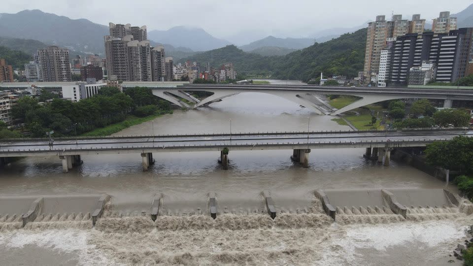 Taiwan's Xindian river rises in New Taipei City as Typhoon Gaemi barrels over Taiwan on July 25, 2024. - Sam Yeh/AFP/Getty Images