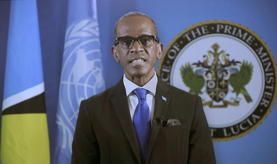 In this photo taken from video, Philip Joseph Pierre, Prime Minister of Saint Lucia, remotely addresses the 76th session of the United Nations General Assembly in a pre-recorded message, Saturday Sept. 25, 2021 at UN headquarters. At the United Nations General Assembly, African and Caribbean countries that stand to benefit from reparations were backed by other nations, though those most responsible for slavery and colonialism said little about what they might owe to African descendants. (UN Web TV via AP)