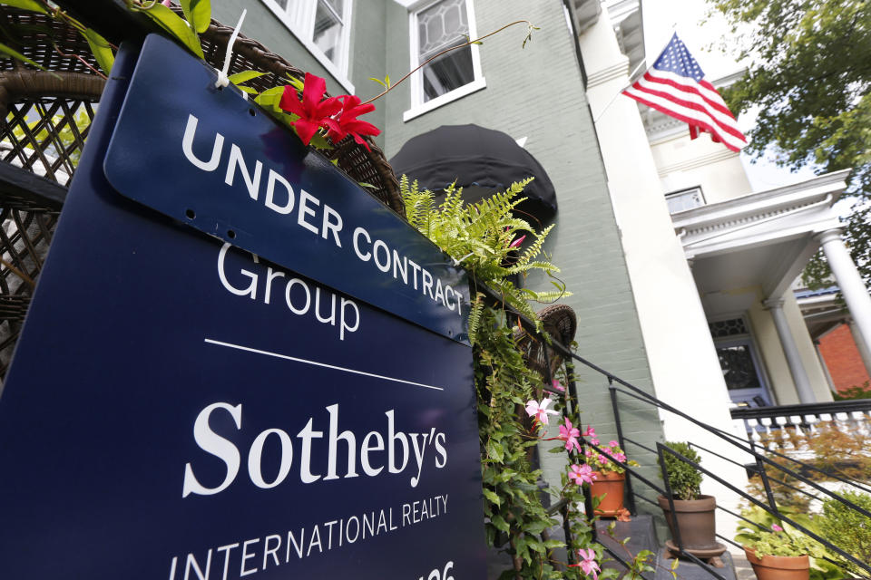 In this Aug. 16, 2019, photo an under contract sign is displayed by a home in Richmond, Va. On Thursday, Sept. 26, the National Association of Realtors releases its August report on pending home sales, which are seen as a barometer of future purchases. (AP Photo/Steve Helber)