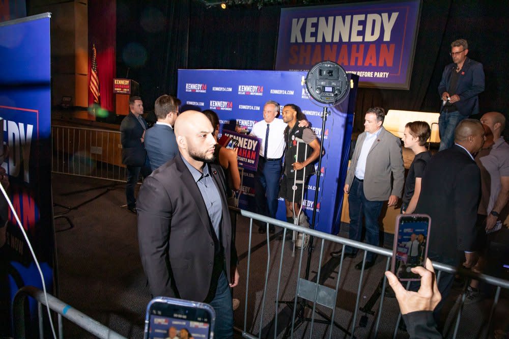 Kennedy poses with supporters while surrounded by security at an event in Albuquerque, NM on June 15, 2024.<span class="copyright">David Williams for TIME</span>